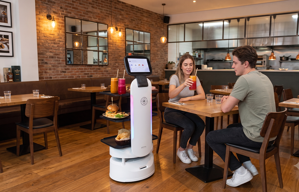 ServeBot serving a table