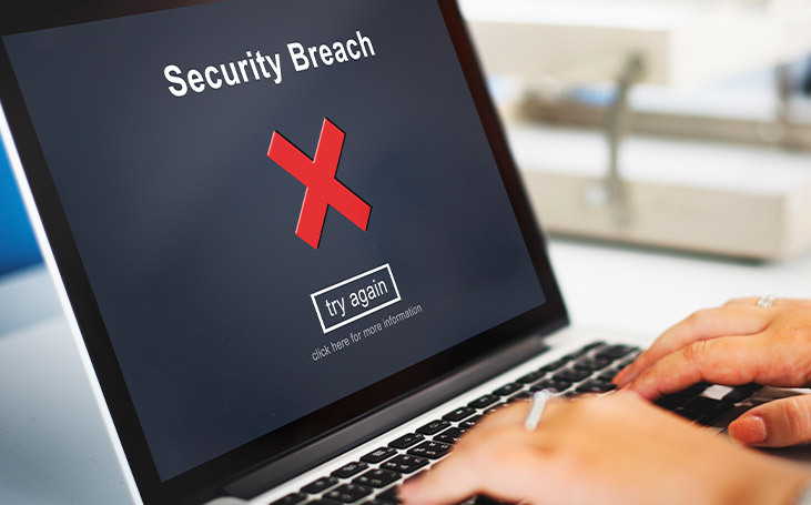 Security breach warning on a laptop screen