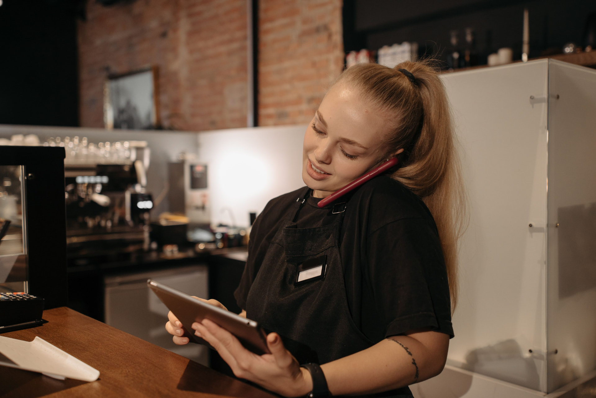 Manager reviewing the schedule on a tablet