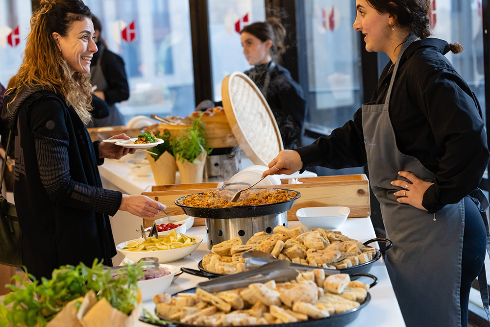 Catering staff serving guests at a private event