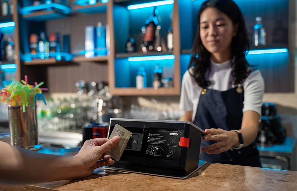 Handheld payment terminal on the swipe card screen